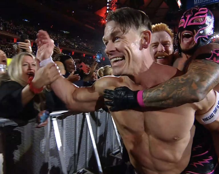 Cena and his team win a WWE match.