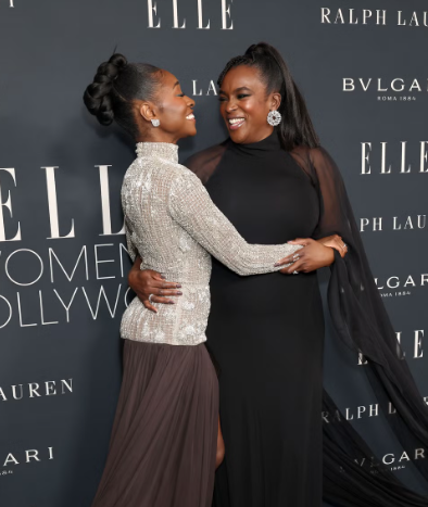 Wunmi Mosaku and Jayme Lawson, Smiling at Each Other On the ELLE Red Carpet.
