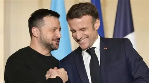 Ukrainian President, Zelensky and French President, Macron Seal The Deal. Photo by: Ludovic Marin