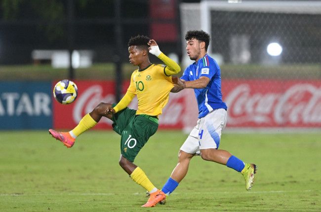 Amajimbos qualify for round of 32 despite losing against Italy.