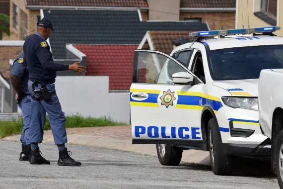 Police investigate mass shooting scene at Bekkersdal tavern in Johannesburg, South Africa.