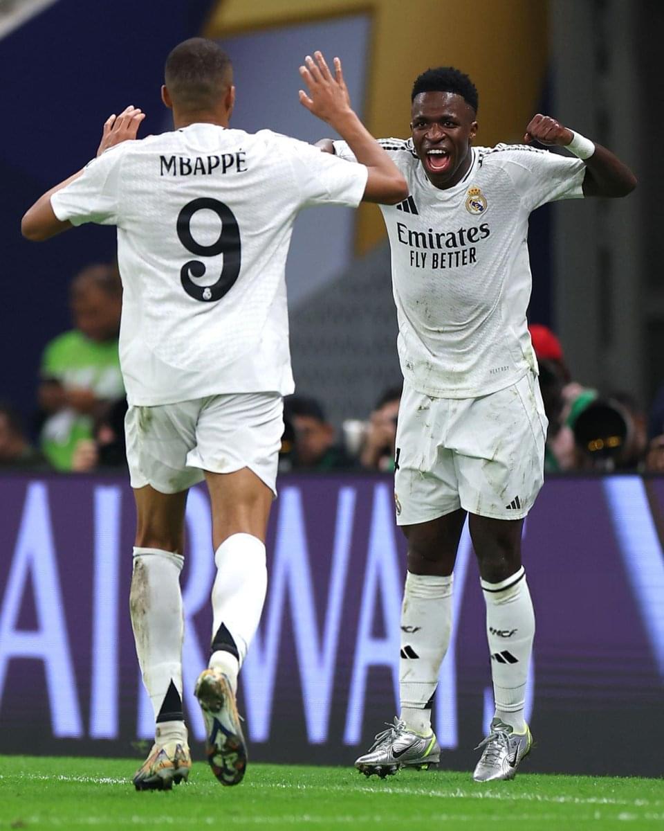 Vinicius Jr and Mbappe celebrating