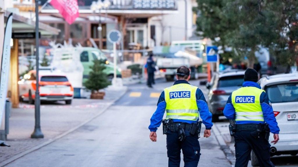 A somber image of the Crans-Montana ski resort with a caption highlighting the US Embassy's condolences and support.